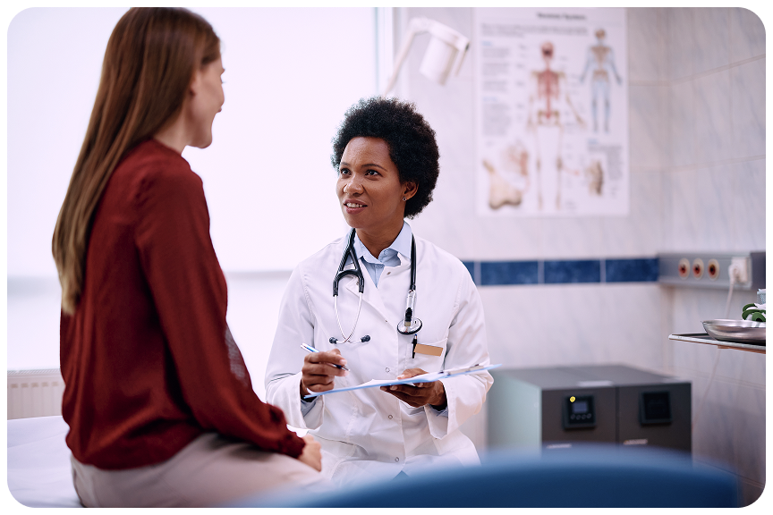 OB/GYN consulting with a patient